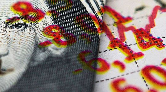 Wall Street slips as trade tensions reignite